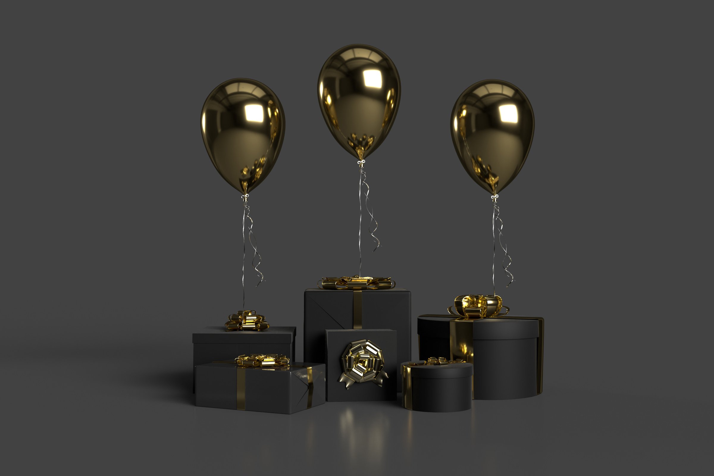 Gold Balloons and Gift Boxes on Black Background
